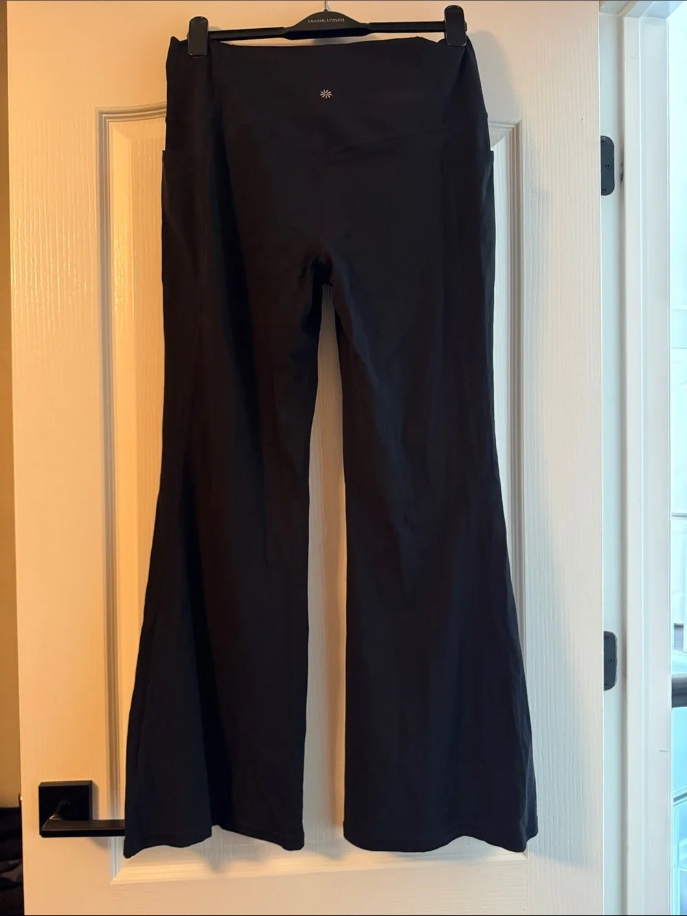 Athleta Black Salutation Stash Women's Flare Pants - Picture 2 of 3